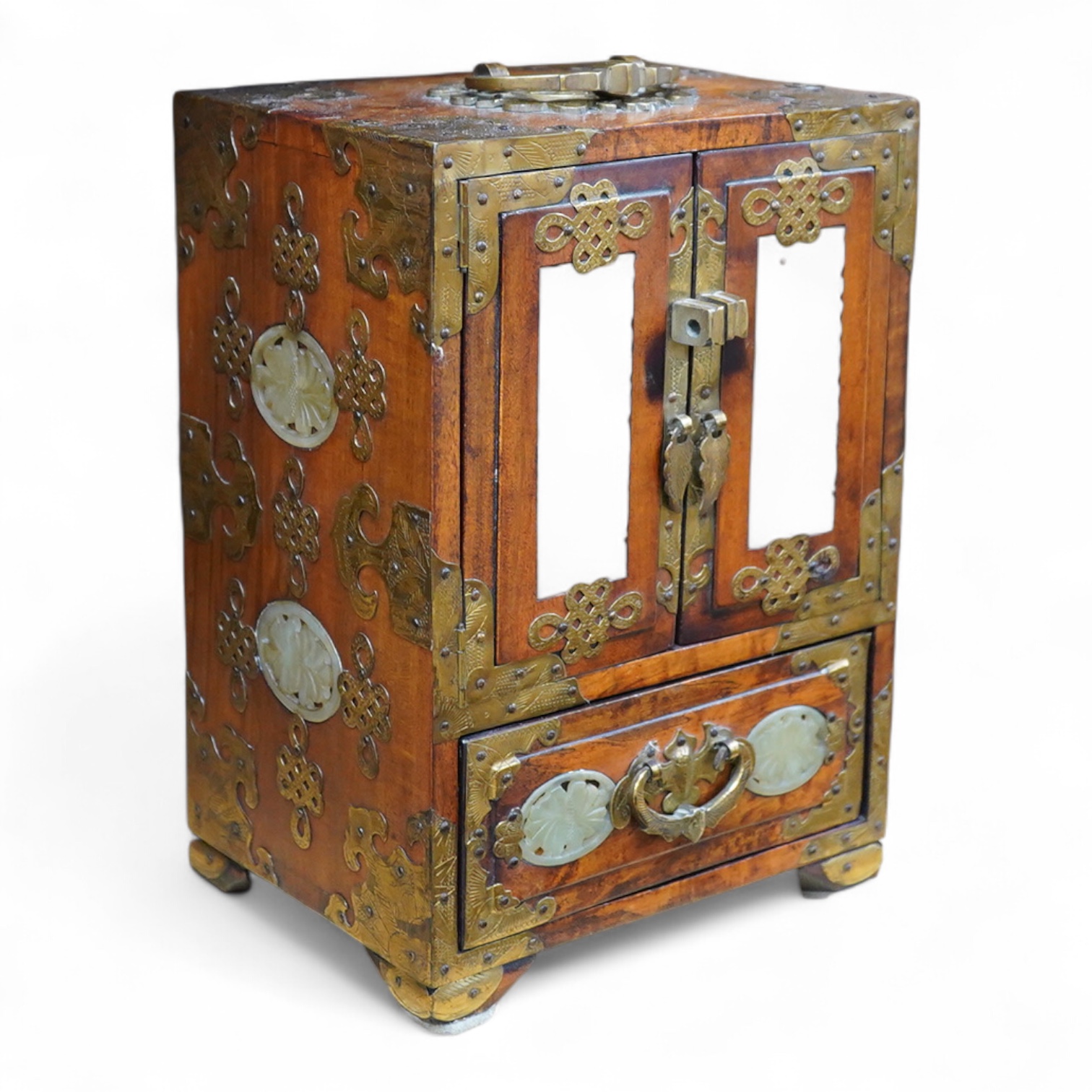 A Chinese walnut jewellery box with carved bowenite jade panels, 24.5cm high